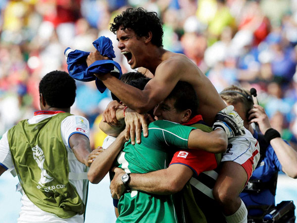 Costa Rica players celebrate following the team's 1-0 victory