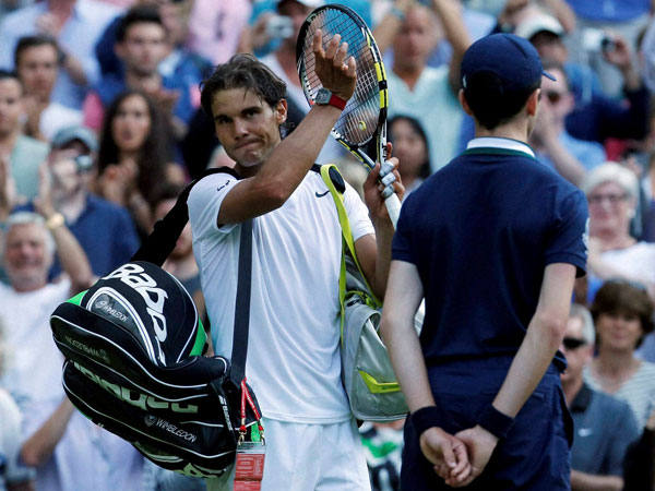 Rafael Nadal of Spain leaves the court