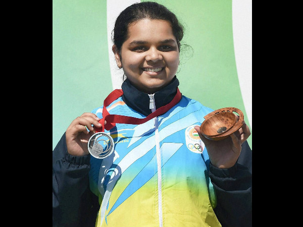 Malaika with her medal