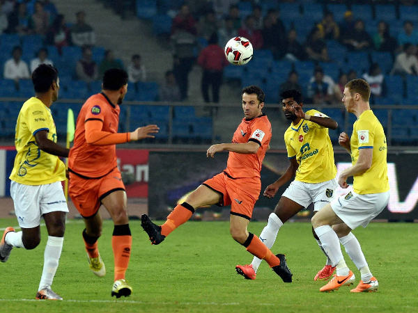 Delhi's Alessandro del Piero (centre) kicks the ball as other players watch Delhi's Alessandro del Piero (centre) kicks the ball as other players watch