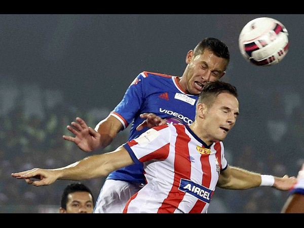 Players of Athletico De Kolkata and FC Goa in action during their 1st leg semi-final Players of Athletico De Kolkata and FC Goa in action during their 1st leg semi-final