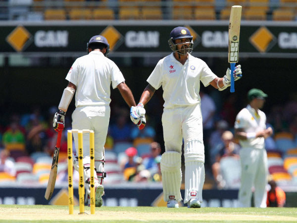 Vijay celebrates his fifty. He went on to score 144