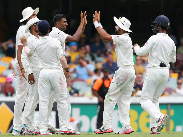 Ashwin is congratulated by teammates after dismissing Watson