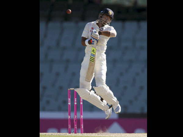 Rahul jumps to avoid a bouncer from Starc