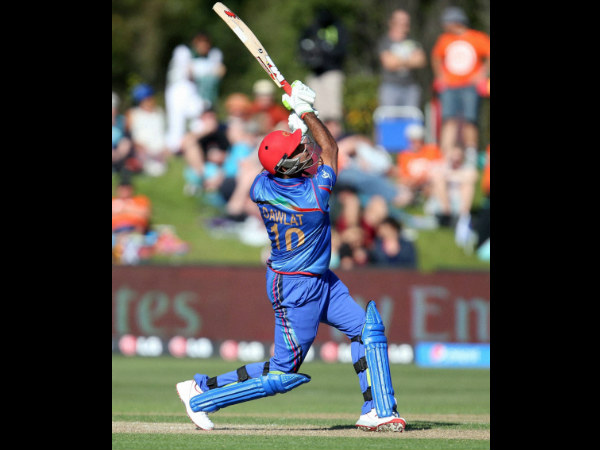 Afghanistan’s Dawlat Zadran plays a shot