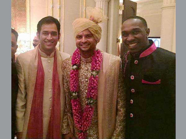 Cricketers MS Dhoni and D Bravo at the marriage ceremony