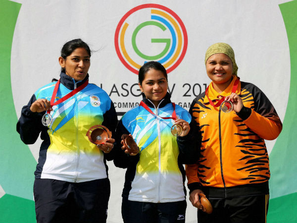 File photo: Gold medallist Apurvi Chandela, centre, poses for with teammate and silver medallist Ayonika Paul, left, and bronze medallist Nur Suryani Mohamed Taibi of Malaysia, following the 10m Rifle Women Final at the 2014 Commonwealth Games in Glasgow, Scotland, on July 26, 2014 File photo: Gold medallist Apurvi Chandela, centre, poses for with teammate and silver medallist Ayonika Paul, left, and bronze medallist Nur Suryani Mohamed Taibi of Malaysia, following the 10m Rifle Women Final at the 2014 Commonwealth Games in Glasgow, Scotland, on July 26, 2014