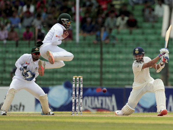 Ajinkya Rahane plays a shot on way to his 98