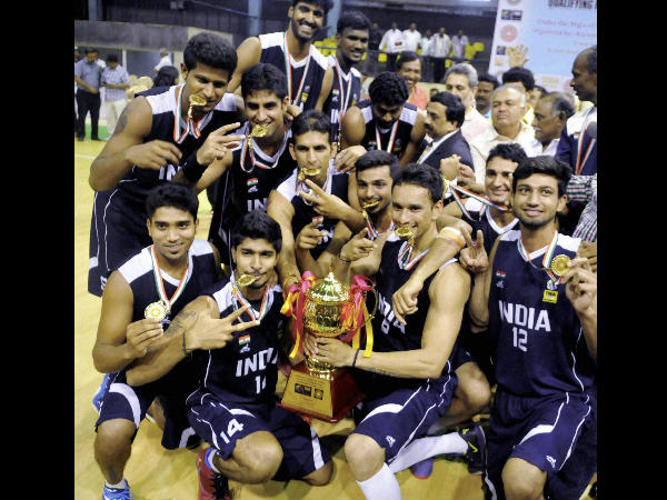 Indian basketball players celebrate after defeating Sri Lanka in final of the 4th South Asian Basketball championship in Bengaluru on Sunday. Indian basketball players celebrate after defeating Sri Lanka in final of the 4th South Asian Basketball championship in Bengaluru on Sunday.