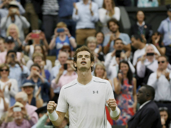 Andy Murray of Britain gestures after defeating Vasek Pospisil of Canada