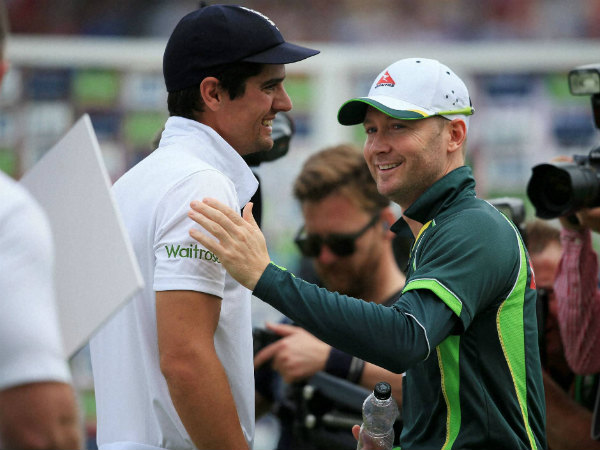 Clarke (right) and Alastair Cook after the match