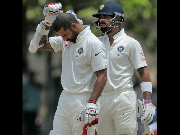 Kohli checks Shikhar after he was hit on the helmet