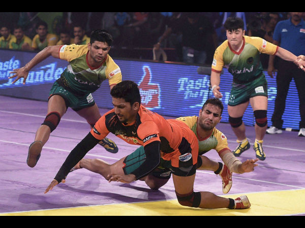 U Mumba (orange) and Patna Pirates (green) players during their semi-final in Mumbai on Friday.