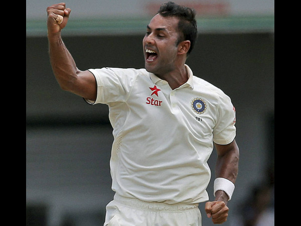 Stuart Binny celebrates the dismissal of Dinesh Chandimal