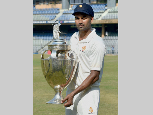 Karnataka captain R Vinay Kumar holds the Ranji Trophy after leading his side to victory in the final against Tamil Nadu in March this year