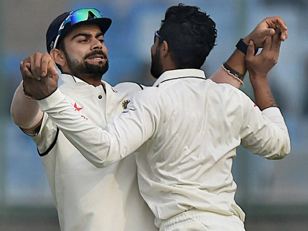 Kohli (left) and Jadeja celebrate Amla's dismissal