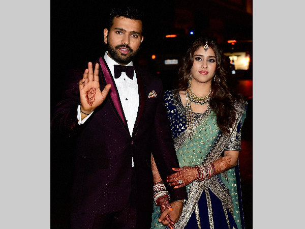 Rohit and Ritika pose for pictures