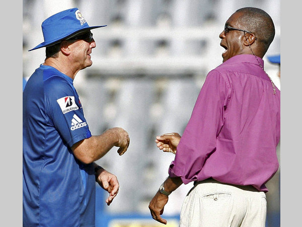 File photo: Holding (right) with former New Zealand captain John Wright File photo: Holding (right) with former New Zealand captain John Wright