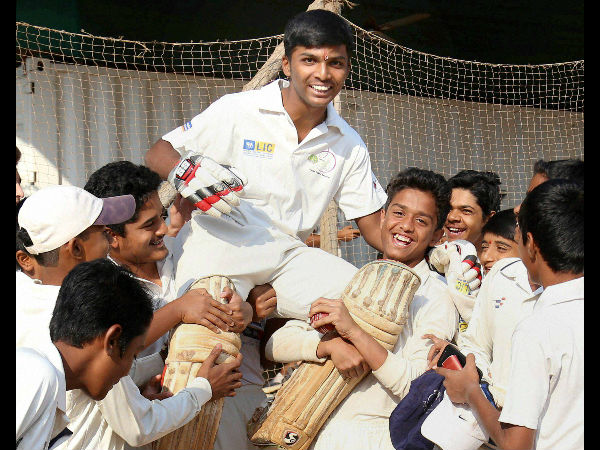 Pranav is hoisted by his team-mates and friends after his world record