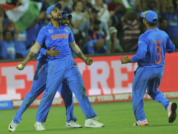 File photo: Virat Kohli (centre) celebrates with Ravindra Jadeja (left) and Suresh Raina after taking a catch to dismiss Shahid Afridi in World Cup 2015