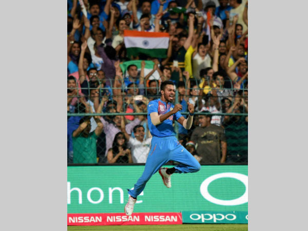 Hardik Pandya celebrates after taking a catch to dismiss Mithun Ali