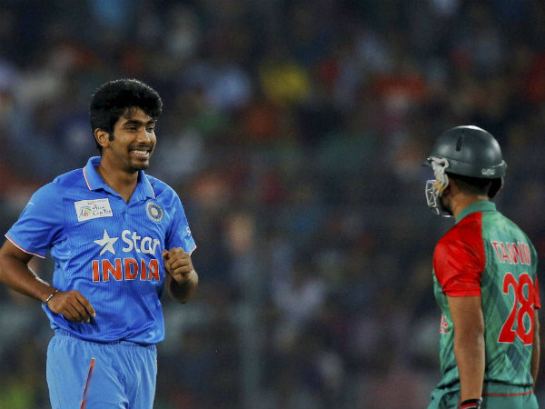 Bumrah (left) gets the wicket of Tamim (right)