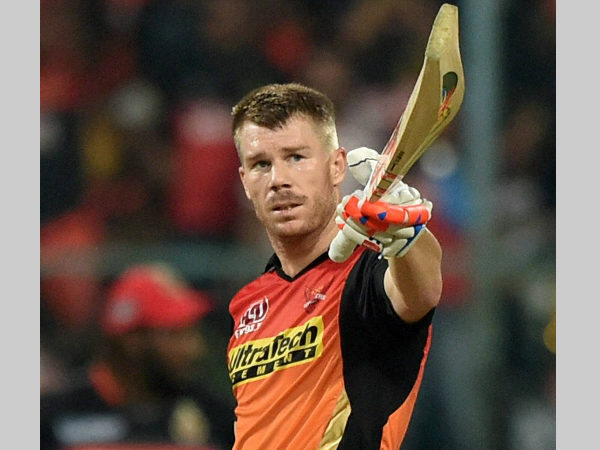 David Warner celebrates his half century