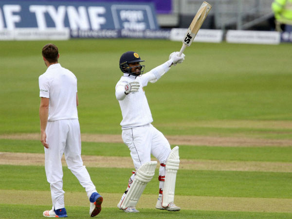 Sri Lanka's Dinesh Chandimal celebrates his 100 celebrates against England during day four of the second cricket Test match at the Emirates Riverside, Chester-Le-Street, England.