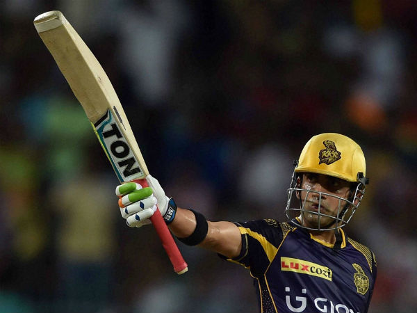 KKR batsman Gautam Gambhir acknowledging crowds after complete his half century during an IPL match against RCB 