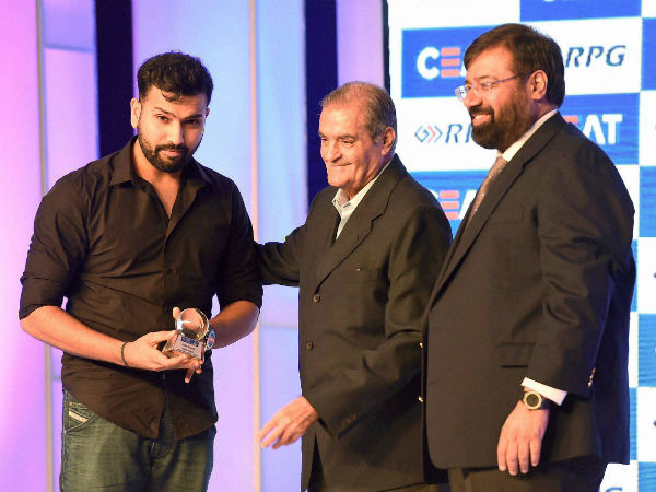 Industrialist Harsh Goenka and former Indian cricketer Nari Contractor present the CEAT Cricket Rating Indian Cricketer of the year award to cricketer Rohit Sharma in Mumbai on Monday. Industrialist Harsh Goenka and former Indian cricketer Nari Contractor present the CEAT Cricket Rating Indian Cricketer of the year award to cricketer Rohit Sharma in Mumbai on Monday.