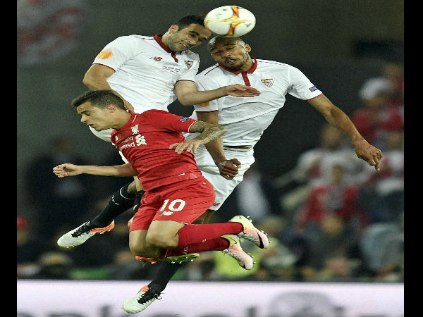 Liverpool's Philippe Coutinho, center, loses out to Sevilla's Adil Rami, left, and Steven N'Zonzi during the Europa League final soccer match between Liverpool and Sevilla in Basel, Switzerland, May 18, 2016. Liverpool's Philippe Coutinho, center, loses out to Sevilla's Adil Rami, left, and Steven N'Zonzi during the Europa League final soccer match between Liverpool and Sevilla in Basel, Switzerland, May 18, 2016.