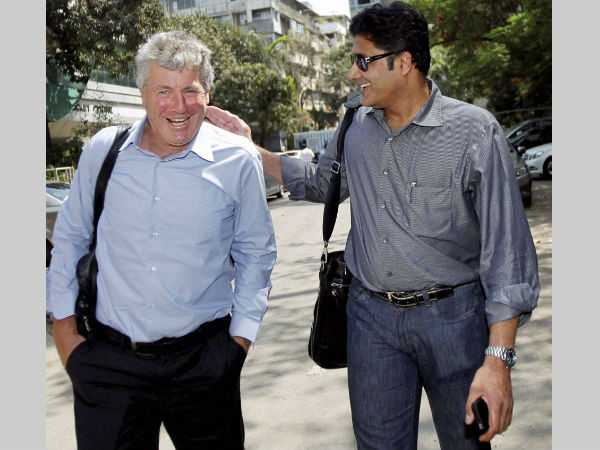 Kumble with former India coach John Wright (left)