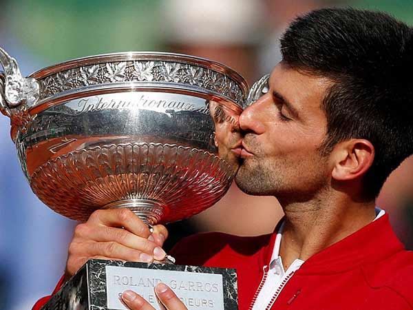 Novak Djokovic with French Open trophy. Novak Djokovic with French Open trophy.