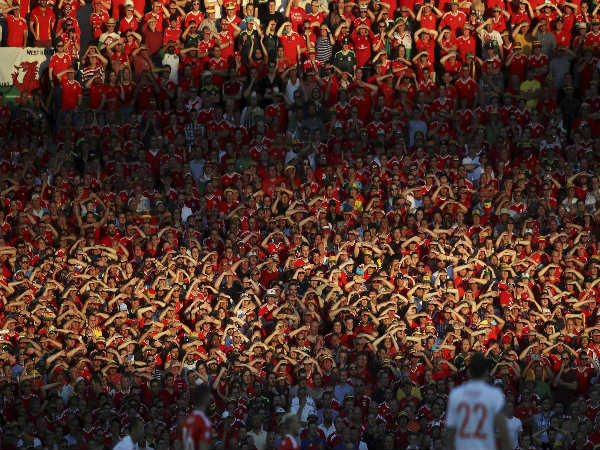 Wales fans watch the Euro 2016 Group B soccer match between Russia and Wales at the Stadium municipal in Toulouse, France, on June 20, 2016. 