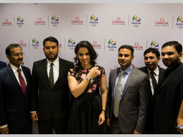 Saina with the officials of Omega