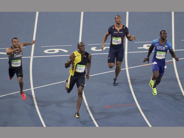 Usain Bolt (second left)
