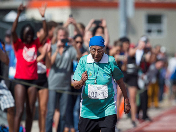 Man Kaur competes in the 100-meter track and field event at the American Masters Games