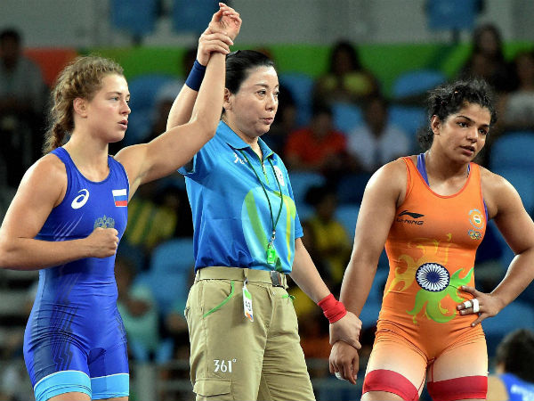  Russian wrestler Valeria Koblova celebrates after winning against India's Sakshi Malik during the quarterfinal match of Women's freestyle 58 kg at Summer Olympics 2016 at Rio de Janeiro in Brazil on Wednesday.