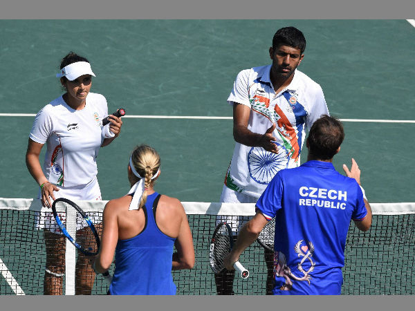India's Sania Mirza and Rohan Bopanna during their mixed-doubles semifinal match after they lost to Czech Republic's Lucie Hradecka and Radek Stepanek. 1-6, 5-7.