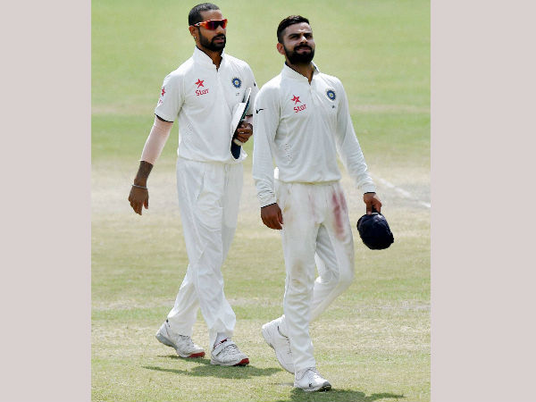 A proud skipper Virat Kohli walks back after win