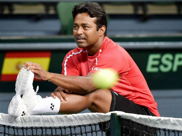 Paes stretches stretches during a practice session in New Delhi on Monday (September 12) as he gets ready to face Spain in Davis Cup