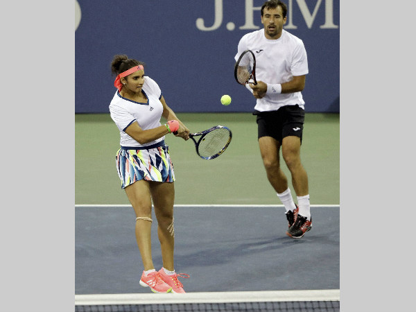 Sania Mirza and Ivan Dodig in action at US Open Sania Mirza and Ivan Dodig in action at US Open