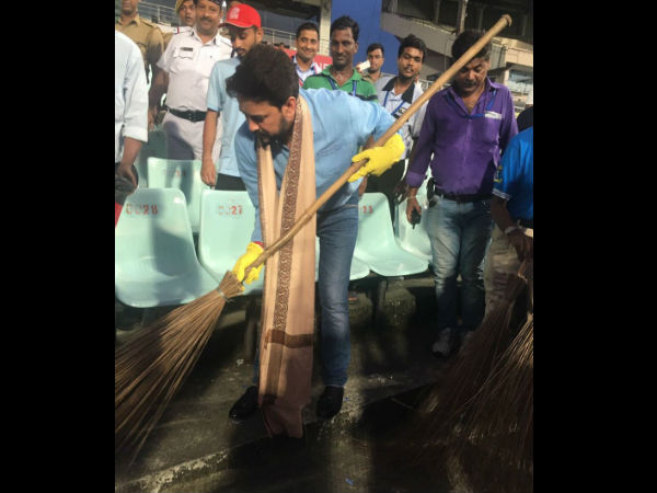 Anurag Thakur cleans the stands