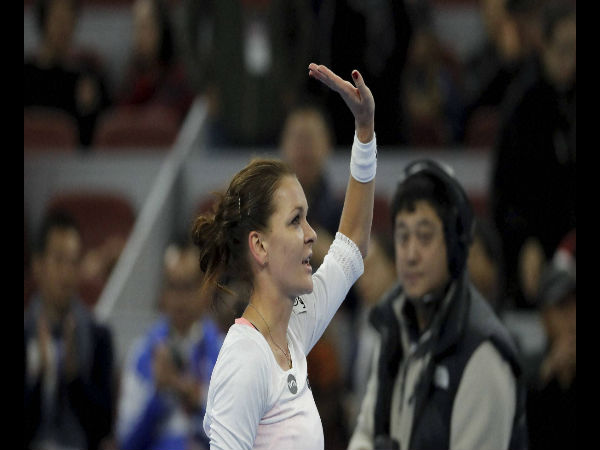 Agnieszka Radwanska of Poland waves to spectators Agnieszka Radwanska of Poland waves to spectators