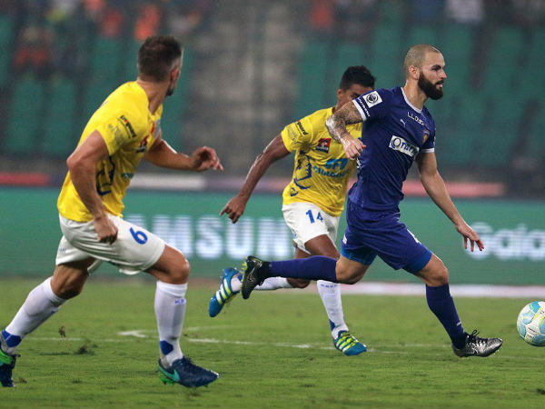 Chennaiyin FC's Hans Mulder (blue) goes past Kerala Blasters defenders (Image courtesy: ISL Twitter Handle) Chennaiyin FC's Hans Mulder (blue) goes past Kerala Blasters defenders (Image courtesy: ISL Twitter Handle)