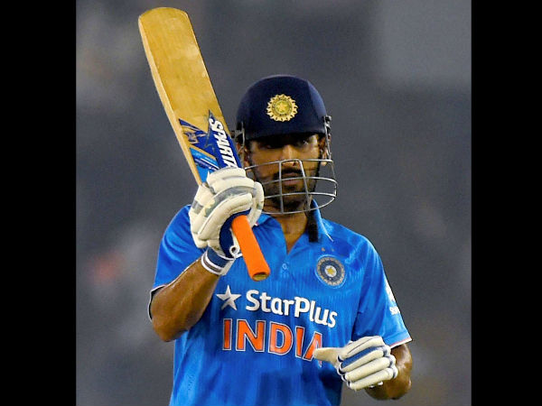 MS Dhoni celebrates his 50 runs in the third ODI match against New Zealand in Mohali 