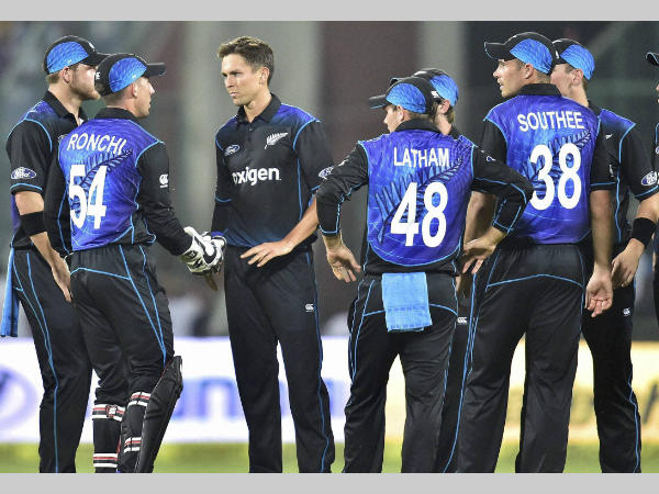 Trent Boult (3rd left) and celebrates with team-mates after dismissing Rohit Sharma (not pictured)