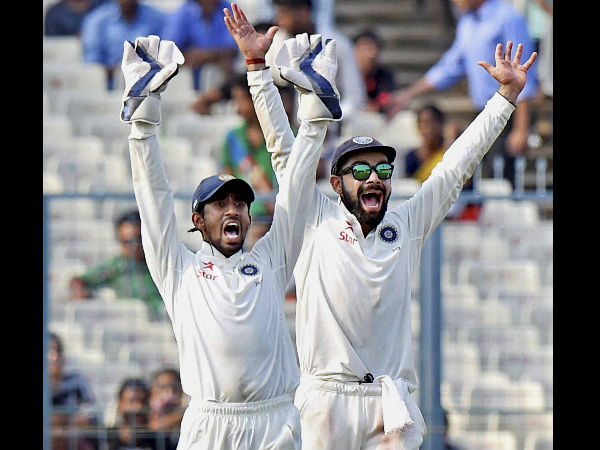 Virat Kohli and Wriddhiman Saha 