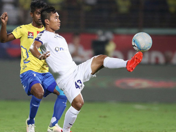 Kerala Blasters and Chennaiyin FC players fight for the ball Kerala Blasters and Chennaiyin FC players fight for the ball
