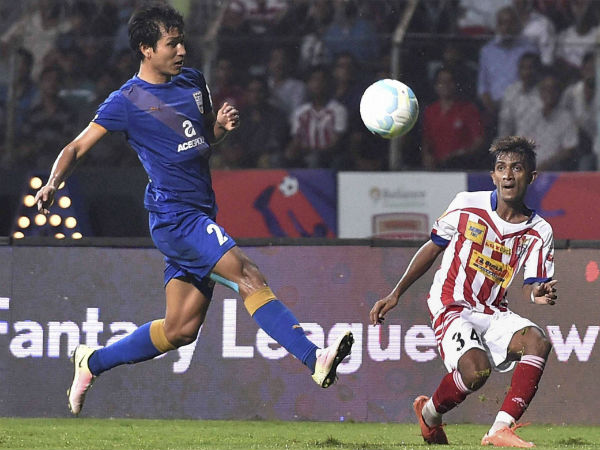 Atletico de Kolkata (red white) and Mumbai City FC players in action during ISL match in Kolkata.